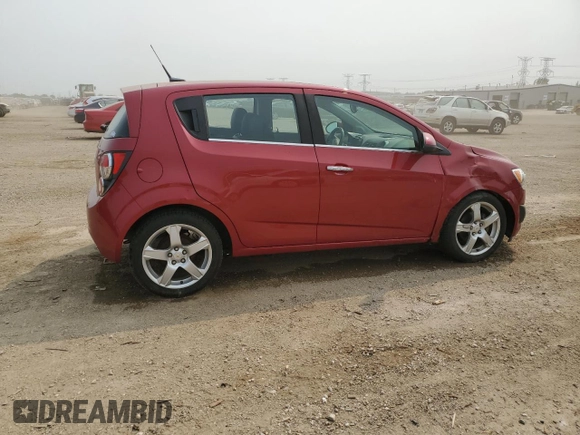 2012 Chevrolet Sonic LTZ with VIN 1G1JE6SH7C4111176, listed as a Copart auction lot 59002575 with 116,640 mi miles and Salvage title. Bid and sale history available at DreamBid. Image 3.