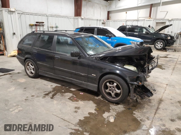 1997 BMW M3 with VIN WBACE11020EZ24250, listed as a Copart auction lot 85107784 with 147,369 mi miles and Clean title. Bid and sale history available at DreamBid. Image 4.