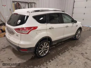 2016 Ford Escape SE with VIN 1FMCU9GX5GUA55969, listed as a IAAI auction lot 41630684 with 168,038 mi miles. Bid and sale history available at carsss.com. Image 4.