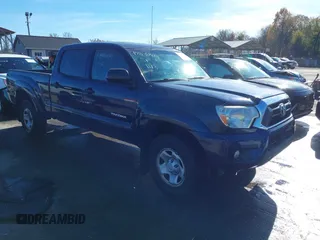 2013 Toyota Tacoma with VIN 3TMMU4FN4DM052928, listed as a IAAI auction lot 40846879 with 113,928 mi miles. Bid and sale history available at carsss.com. Image 1.