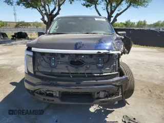 2024 Ford F-150 Lightning Flash z VIN 1FT6W3L7XRWG19735, wystawiony jako Copart lot #50089495 z przebiegiem 7 764 mil mil oraz Szkoda całkowita • Salvage title. Historia ofert i sprzedaży dostępna na DreamBid. Obrazek 5.