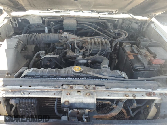 1995 Mitsubishi Montero z VIN JA4MR41H3SJ004800, wystawiony jako Copart lot #72036354 z przebiegiem 209 635 mil mil oraz Szkoda całkowita • Salvage title. Historia ofert i sprzedaży dostępna na DreamBid. Obrazek 12.