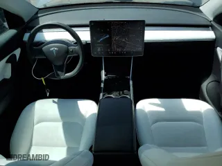 2021 Tesla Model Y Long Range with VIN 5YJYGDEEXMF070154, listed as a Copart auction lot 50742325 with 23,376 mi miles and Salvage Title. Bid and sale history available at carsss.com. Image 8.