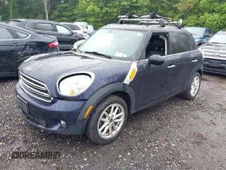 2015 MINI Countryman z VIN WMWZB3C59FWR43890, wystawiony jako IAAI lot #42372407 z przebiegiem 131 884 mil mil oraz . Historia ofert i sprzedaży dostępna na DreamBid. Obrazek 2.