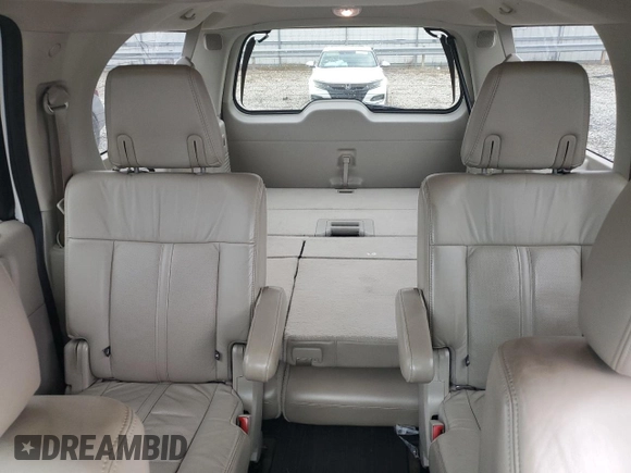2015 Lincoln Navigator z VIN 5LMJJ3HT1FEJ03496, wystawiony jako Copart lot #77615394 z przebiegiem 118 636 mil mil oraz Szkoda całkowita • Salvage title. Historia ofert i sprzedaży dostępna na DreamBid. Obrazek 10.