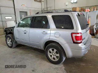 2012 Ford Escape Hybrid with VIN 1FMCU5K37CKB42310, listed as a Copart auction lot 67651144 with 154,852 mi miles and Salvage title. Bid and sale history available at DreamBid. Image 2.