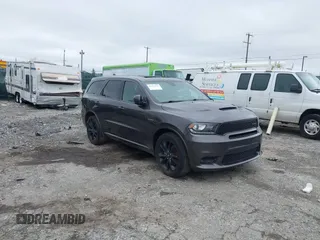 2020 Dodge Durango R/T with VIN 1C4SDJCT2LC346952, listed as a IAAI auction lot 42451221 with 65,696 mi miles and . Bid and sale history available at DreamBid. Image 1.