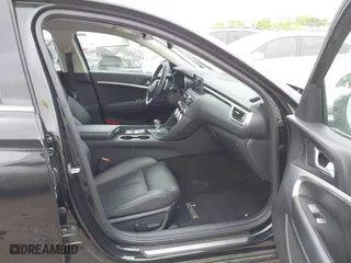 2023 Genesis G70 2.0T with VIN KMTG34TA9PU132552, listed as a IAAI auction lot 42047048 with 39,111 mi miles. Bid and sale history available at carsss.com. Image 5.