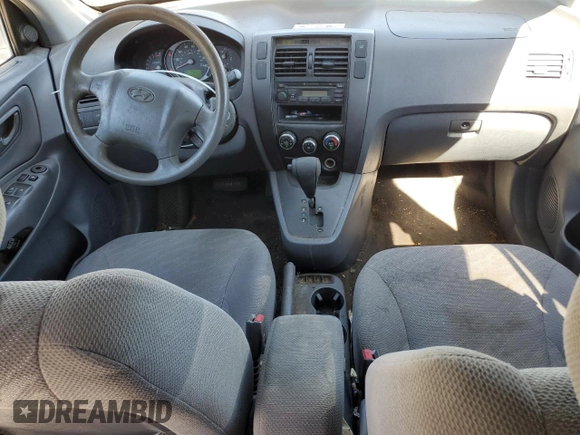 2005 Hyundai Tucson GL with VIN KM8JM12B65U067355, listed as a Copart auction lot 79778064 with 228,041 mi miles and Clean Title. Bid and sale history available at carsss.com. Image 8.