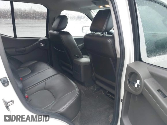 2014 Nissan Xterra X with VIN 5N1AN0NW4EN814113, listed as a IAAI auction lot 41969236 with 111,857 mi miles and . Bid and sale history available at DreamBid. Image 8.