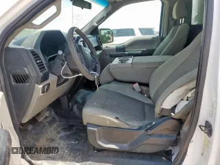 2016 Ford F-150 XL with VIN 1FTNF1CG0GKD81110, listed as a Copart auction lot 57208315 with 211,574 mi miles and Salvage title. Bid and sale history available at DreamBid. Image 7.