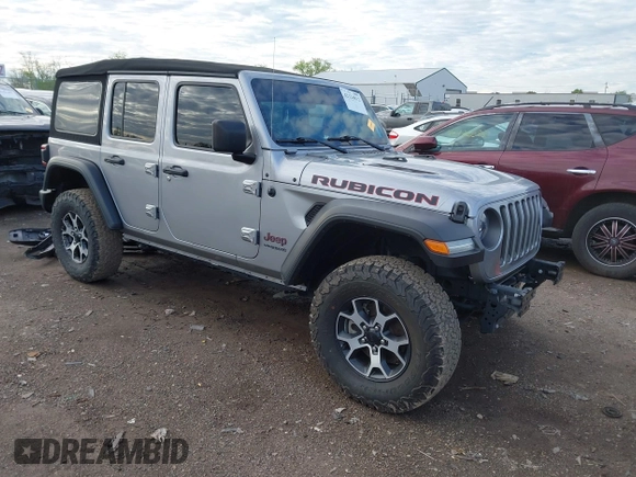 2021 Jeep Wrangler Unlimited Rubicon with VIN 1C4HJXFNXMW560512, listed as a IAAI auction lot 42124812 with 18,034 mi miles and . Bid and sale history available at DreamBid. Image 1.