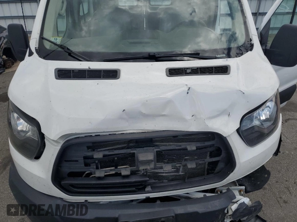 2019 Ford Transit with VIN 1FTYR1YMXKKB37492, listed as a Copart auction lot 56231695 with Not provided miles and Salvage title. Bid and sale history available at DreamBid. Image 12.