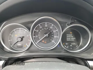 2018 Mazda CX-5 Touring with VIN JM3KFBCM0J0363036, listed as a Copart auction lot 47085755 with 61,928 mi miles and Salvage Title. Bid and sale history available at DreamBid. Image 9.