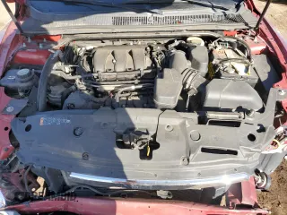 2015 Ford Taurus Limited with VIN 1FAHP2F82FG152083, listed as a Copart auction lot 51980995 with 149,077 mi miles and Salvage Title. Bid and sale history available at carsss.com. Image 12.