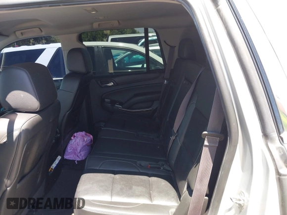 2015 Chevrolet Tahoe LT with VIN 1GNSCBKC9FR111001, listed as a IAAI auction lot 42440624 with 128,087 mi miles and . Bid and sale history available at DreamBid. Image 8.