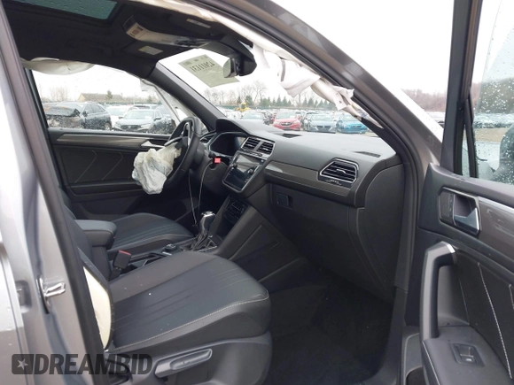 2023 Volkswagen Tiguan SE R-Line Black with VIN 3VV8B7AX3PM130610, listed as a IAAI auction lot 42011131 with 21,980 mi miles and . Bid and sale history available at DreamBid. Image 5.