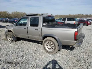 2000 Nissan Frontier XE with VIN 1N6ED27T8YC393355, listed as a Copart auction lot 49607575 with 241,813 mi miles and Salvage title. Bid and sale history available at DreamBid. Image 2.