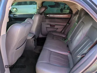 2005 Chrysler 300 with VIN 2C3AA63H35H659798, listed as a Copart auction lot 50322065 with 153,944 mi miles and Salvage Title. Bid and sale history available at carsss.com. Image 10.