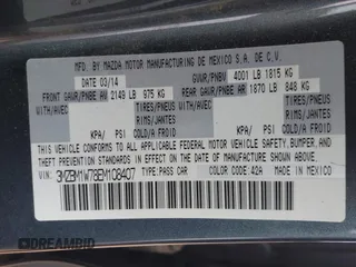 2014 Mazda 3 i Grand Touring with VIN 3MZBM1W78EM108407, listed as a IAAI auction lot 42082720 with 116,632 mi miles and . Bid and sale history available at carsss.com. Image 9.