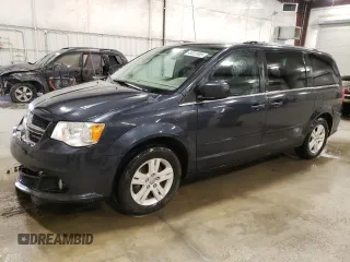 2013 Dodge Grand Caravan Crew with VIN 2C4RDGDG2DR751401, listed as a Copart auction lot 49223985 with 99,602 mi miles and Salvage Title. Bid and sale history available at DreamBid. Image 1.