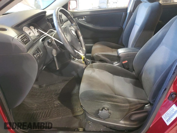 2003 Toyota Corolla CE with VIN 1NXBR32E63Z161048, listed as a Copart auction lot 83226694 with 299,999 mi miles and Salvage Title. Bid and sale history available at DreamBid. Image 7.