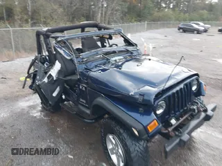 2006 Jeep Wrangler X with VIN 1J4FA39SX6P735379, listed as a IAAI auction lot 40945788 with 69,868 mi miles. Bid and sale history available at carsss.com. Image 6.