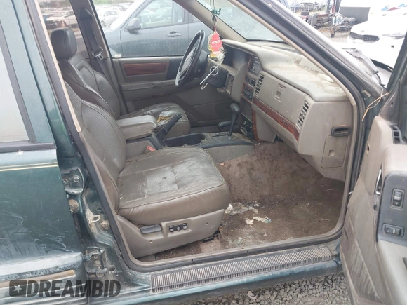 1993 Jeep Grand Cherokee Limited with VIN 1J4GZ78S1PC525798, listed as a IAAI auction lot 42572328 with 197,551 mi miles and . Bid and sale history available at DreamBid. Image 5.