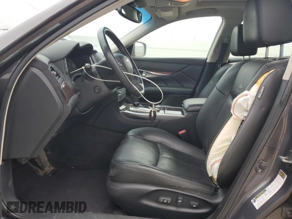 2011 Infiniti M37 with VIN JN1BY1AR2BM371065, listed as a Copart auction lot 74764014 with 175,130 mi miles and Salvage Title. Bid and sale history available at carsss.com. Image 7.