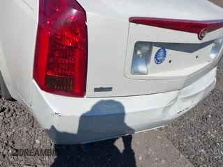 2005 Cadillac CTS z VIN 1G6DP567550128758, wystawiony jako IAAI lot #42069760 z przebiegiem Nie podano mil oraz . Historia ofert i sprzedaży dostępna na DreamBid. Obrazek 6.