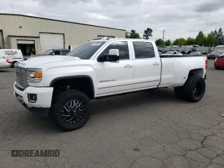2019 GMC Sierra 3500HD Denali z VIN 1GT42WEY5KF119305, wystawiony jako Copart lot #57680105 z przebiegiem 92 449 mil mil oraz Szkoda całkowita • Salvage title. Historia ofert i sprzedaży dostępna na DreamBid. Obrazek 1.