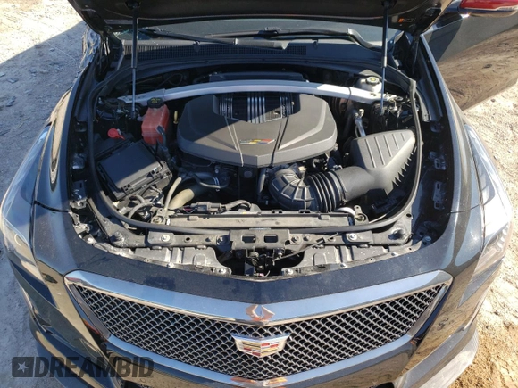 2018 Cadillac CTS-V z VIN 1G6A15S64J0157874, wystawiony jako Copart lot #70587854 z przebiegiem 40 802 mil mil oraz Szkody całkowita. Historia ofert i sprzedaży dostępna na DreamBid. Obrazek 11.