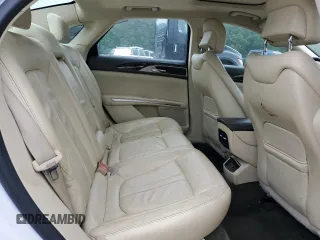 2013 Lincoln MKZ z VIN 3LN6L2J91DR823693, wystawiony jako Copart lot #55827045 z przebiegiem 173 978 mil mil oraz Szkoda całkowita • Salvage title. Historia ofert i sprzedaży dostępna na DreamBid. Obrazek 10.