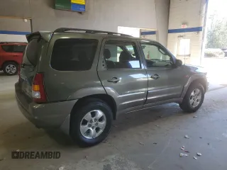 2002 Mazda Tribute LX with VIN 4F2YU09142KM39082, listed as a Copart auction lot 49973375 with 128,002 mi miles and Clean Title. Bid and sale history available at carsss.com. Image 3.