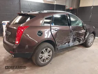 2015 Cadillac SRX Luxury Collection with VIN 3GYFNEE3XFS529754, listed as a IAAI auction lot 41727672 with 52,331 mi miles. Bid and sale history available at carsss.com. Image 4.