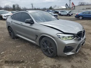 2021 BMW X4 M z VIN 5YMUJ0C03M9F20053, wystawiony jako Copart lot #87595845 z przebiegiem Nie podano mil oraz Szkody całkowita. Historia ofert i sprzedaży dostępna na DreamBid. Obrazek 4.