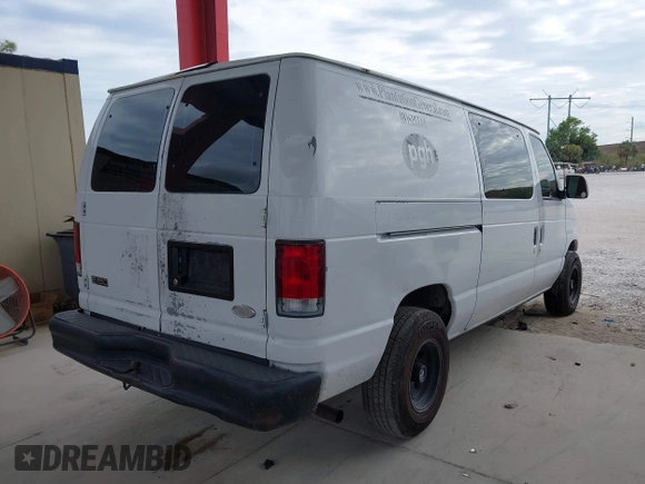 2001 Ford Econoline Cargo with VIN 1FTRE14261HA22632, listed as a IAAI auction lot 41202164 with 153,412 mi miles and . Bid and sale history available at DreamBid. Image 4.