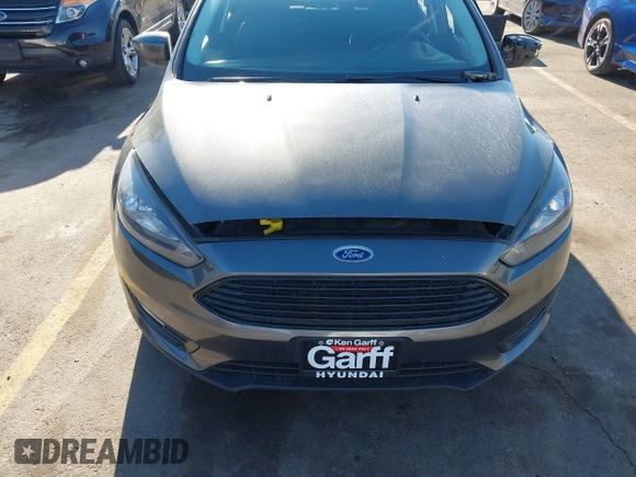 2018 Ford Focus SE with VIN 1FADP3FE0JL270966, listed as a IAAI auction lot 42206548 with 89,067 mi miles and . Bid and sale history available at DreamBid. Image 12.
