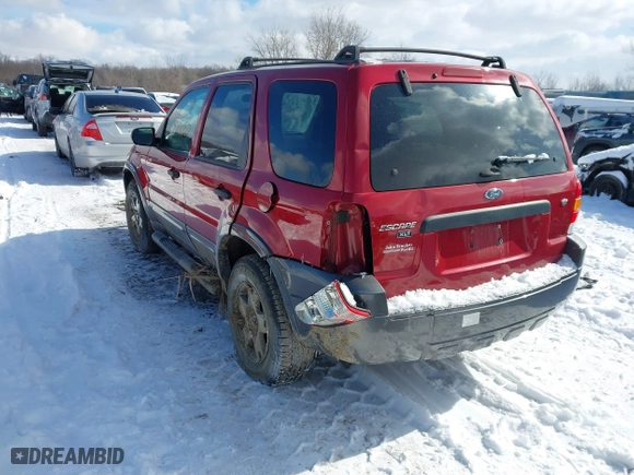 2005 Ford Escape XLT with VIN 1FMYU931X5KD99667, listed as a IAAI auction lot 41591057 with 69,595 mi miles. Bid and sale history available at carsss.com. Image 3.