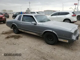 1986 Chevrolet Monte Carlo Sport с VIN 1G1GZ37Z7GR102095, выставлен на аукционе Copart как лот 77247544 с пробегом 87 728 миль миль и Чистый • Clean title. История ставок и продаж доступна на DreamBid. Изображение 4.