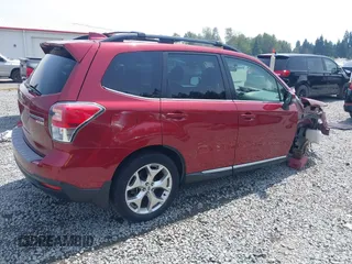 2017 Subaru Forester Touring with VIN JF2SJATC9HH576959, listed as a IAAI auction lot 42550955 with 138,810 mi miles and . Bid and sale history available at DreamBid. Image 4.
