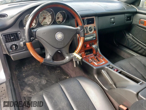 2003 Mercedes-Benz SLK 320 with VIN WDBKK65F73F284794, listed as a Copart auction lot 55833335 with 90,033 mi miles and Salvage title. Bid and sale history available at DreamBid. Image 8.