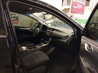 2015 Nissan Sentra S with VIN 3N1AB7AP0FY319869, listed as a IAAI auction lot 41844863 with 144,682 mi miles. Bid and sale history available at carsss.com. Image 5.