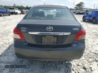 2009 Toyota Yaris z VIN JTDBT903291313024, wystawiony jako Copart lot #54714205 z przebiegiem 338 203 mil mil oraz Szkody całkowita. Historia ofert i sprzedaży dostępna na DreamBid. Obrazek 6.