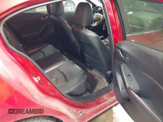 2015 Mazda 3 S Grand Touring with VIN JM1BM1M35F1233107, listed as a IAAI auction lot 41548503 with 141,496 mi miles and . Bid and sale history available at DreamBid. Image 8.