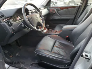 2002 Mercedes-Benz E-Class with VIN WDBJF82J32X066803, listed as a Copart auction lot 85474614 with 77,358 mi miles and Salvage Title. Bid and sale history available at carsss.com. Image 7.
