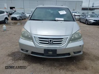2009 Honda Odyssey Touring z VIN 5FNRL38979B052923, wystawiony jako IAAI lot #42427207 z przebiegiem 201 483 mil mil oraz . Historia ofert i sprzedaży dostępna na DreamBid. Obrazek 12.