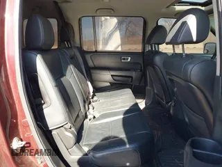 2014 Honda Pilot EX-L with VIN 5FNYF4H52EB055650, listed as a IAAI auction lot 41544068 with 205,942 mi miles and . Bid and sale history available at DreamBid. Image 8.