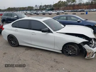 2020 BMW 3 Series M340i with VIN WBA5U7C0XLA232275, listed as a IAAI auction lot 41210369 with 56,220 mi miles and . Bid and sale history available at DreamBid. Image 13.