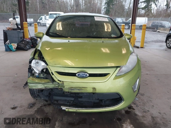 2011 Ford Fiesta SES with VIN 3FADP4FJ7BM127600, listed as a IAAI auction lot 41657170 with 135,483 mi miles. Bid and sale history available at carsss.com. Image 13.